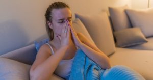 women experiencing pain from sinusitis